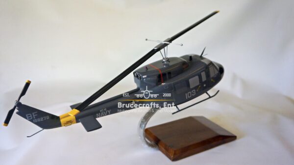 Model of UH-1N Twin Huey US NAVY 103 Aircraft with detailed craftsmanship.